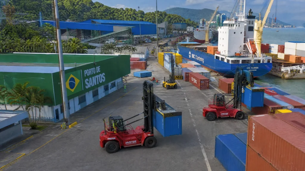 Modern logistics and port operations in Brazil showing diesel rough terrain forklifts handling containers and materials in demanding warehouse and dock environments